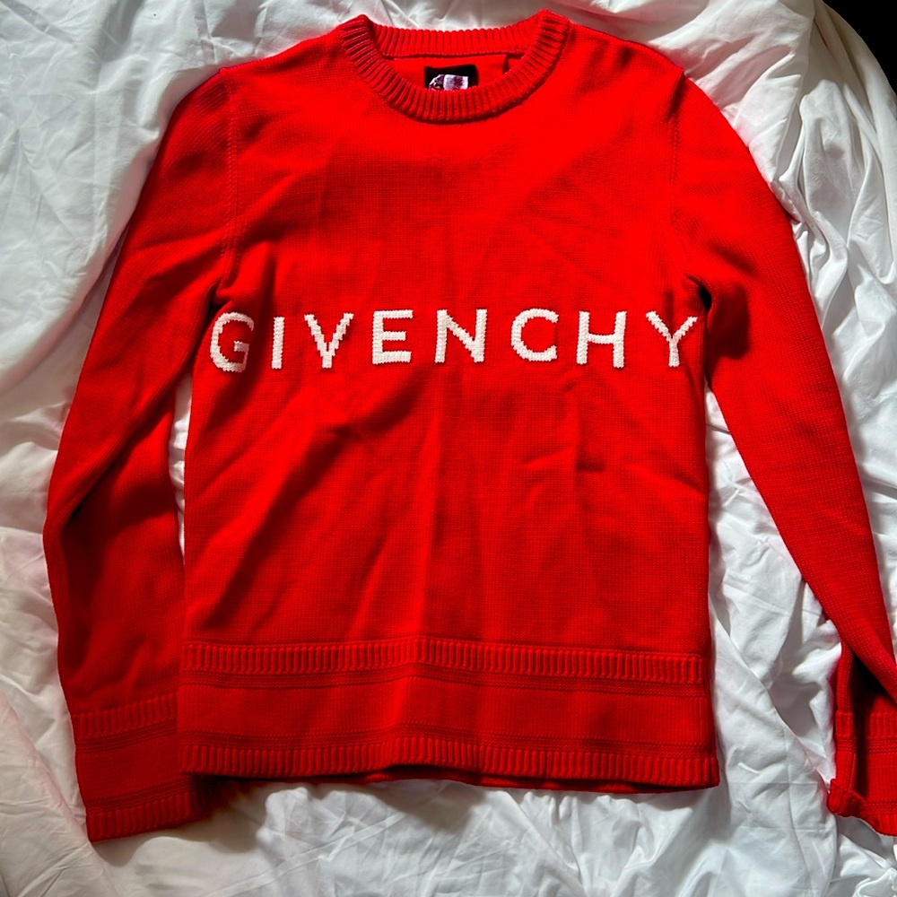 Red given she sweater